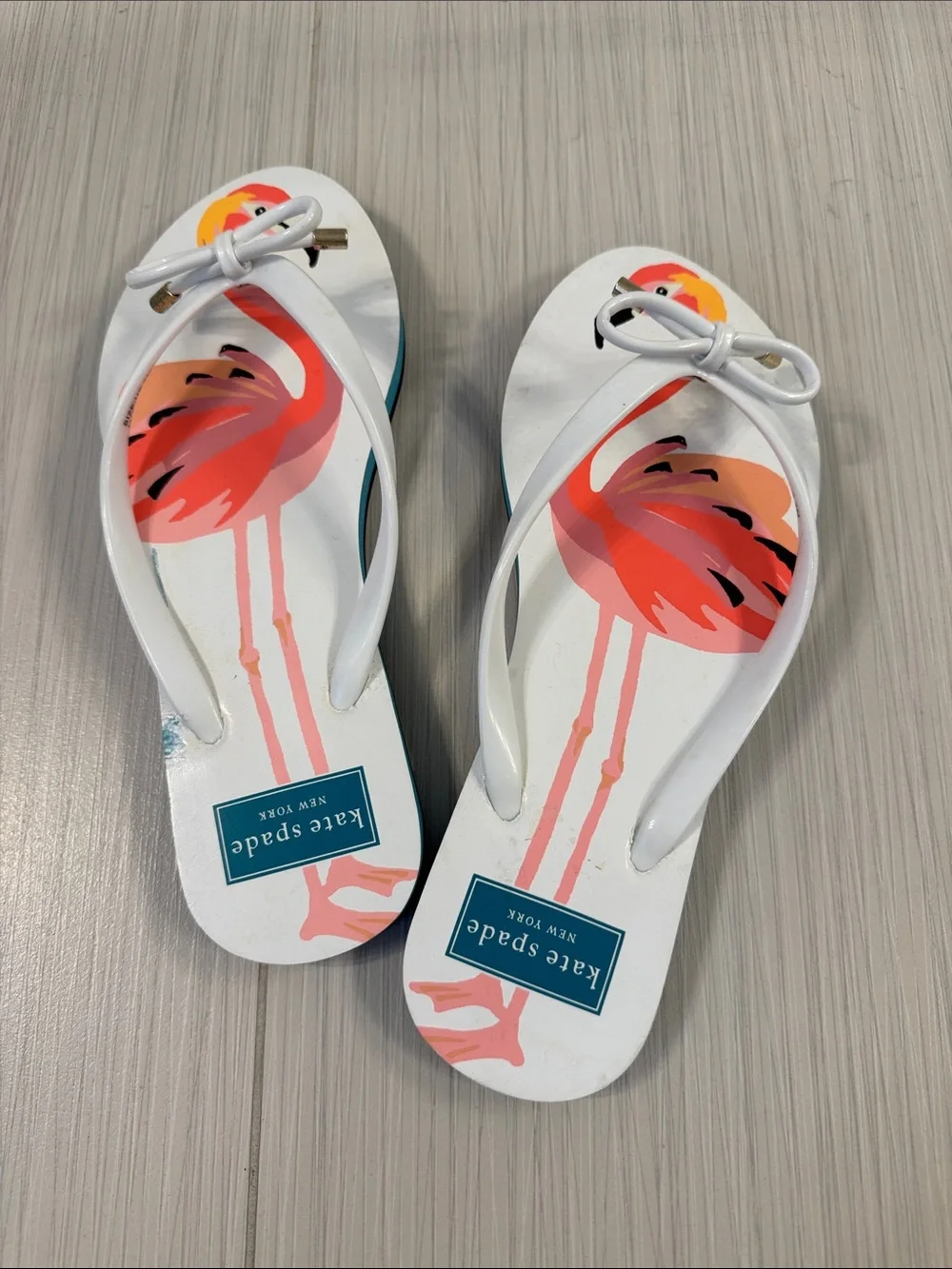 kate spade White Flip Flops with Pink & Coral Flamingo Print